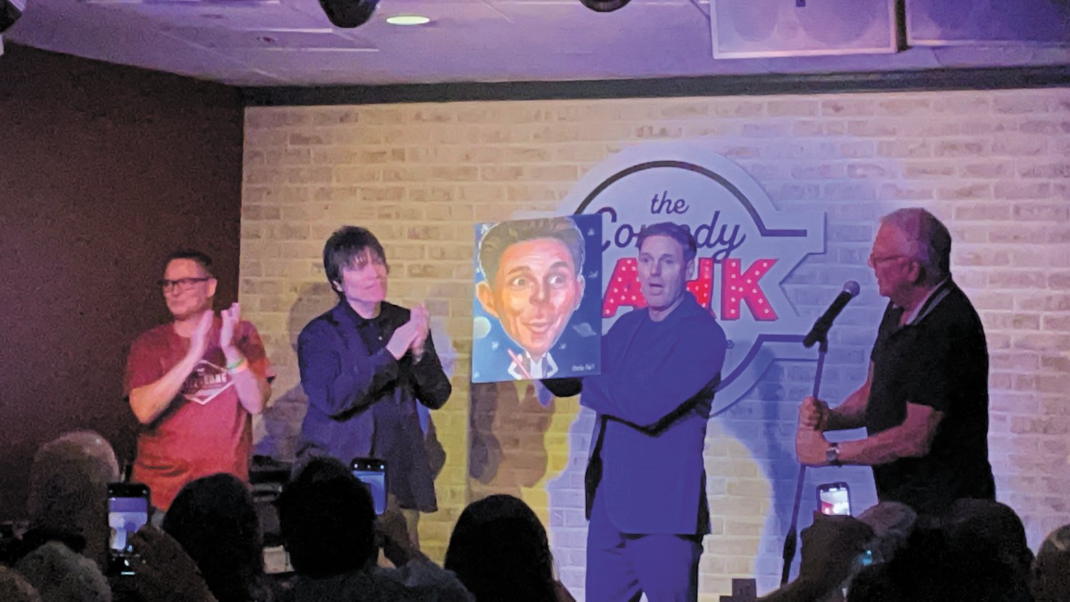 HE’S OFFICIALLY IN: From left: Ace Aceto, Joe Hebert, Al Ducharme and Charlie Hall giving Al his official caricature.
